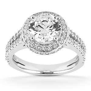 Goldara, 18k halo engagement ring